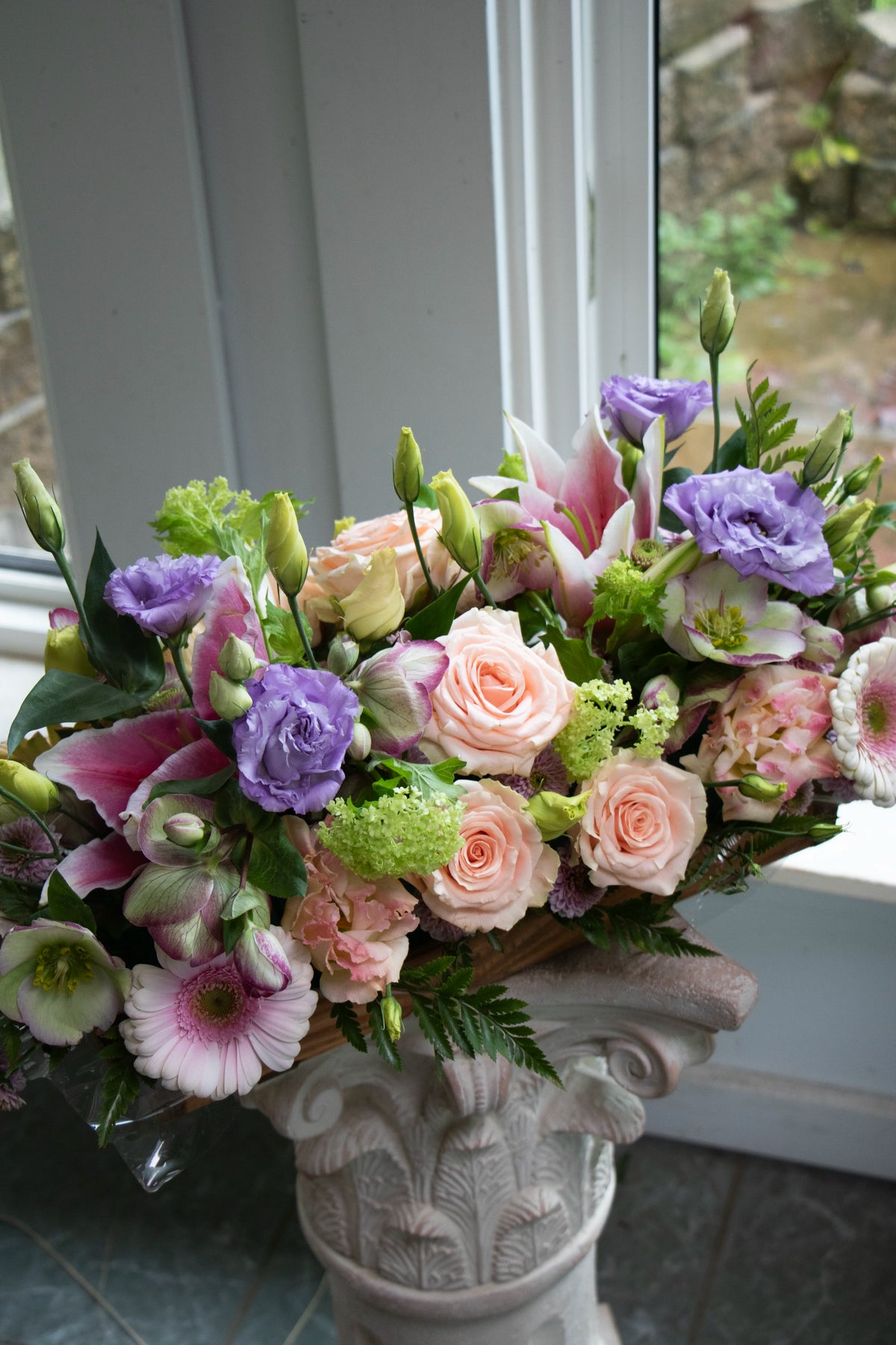 Dining table centrepiece of seasonal flowers